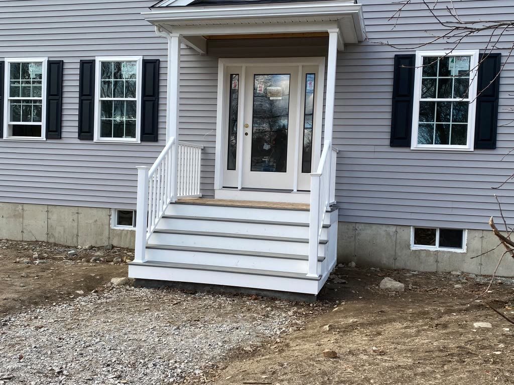 Front door with new white steps