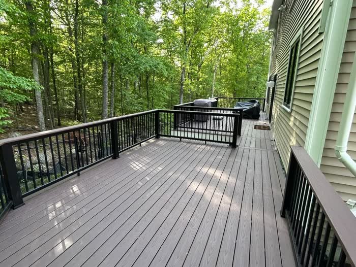 Long composite deck with railing