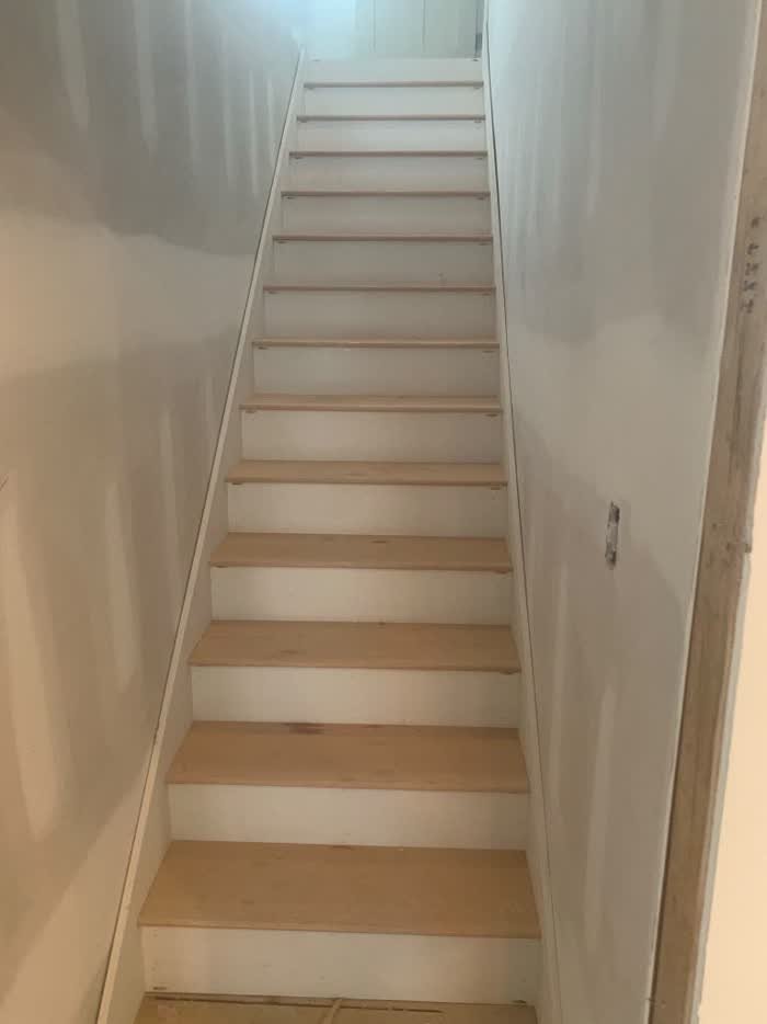 Narrow interior staircase, freshly installed